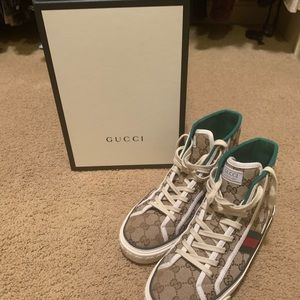 Women’s high top Gucci tennis shoes